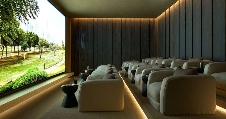 Private cinema with soft armchairs, timber walls and large screen