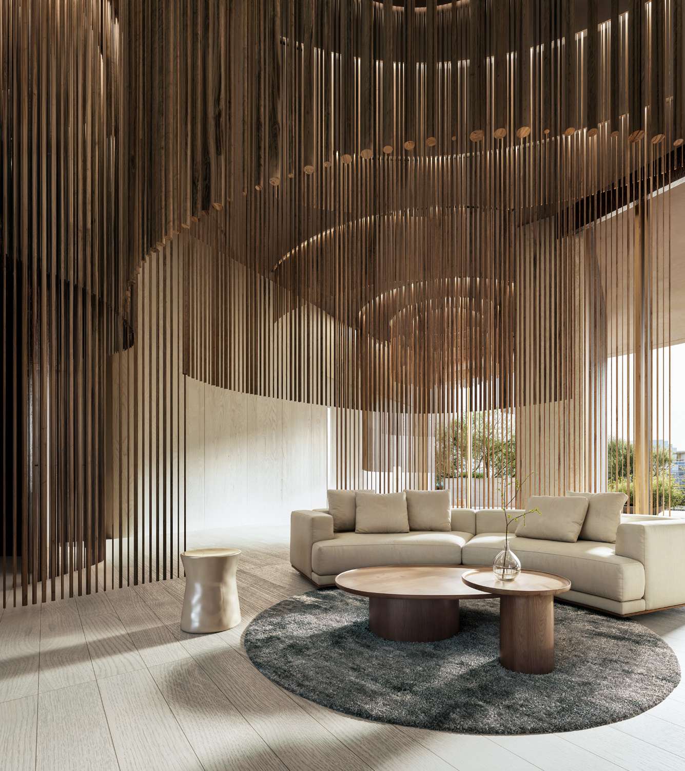 Lounge with cream sofa under a canopy of hanging timber rods